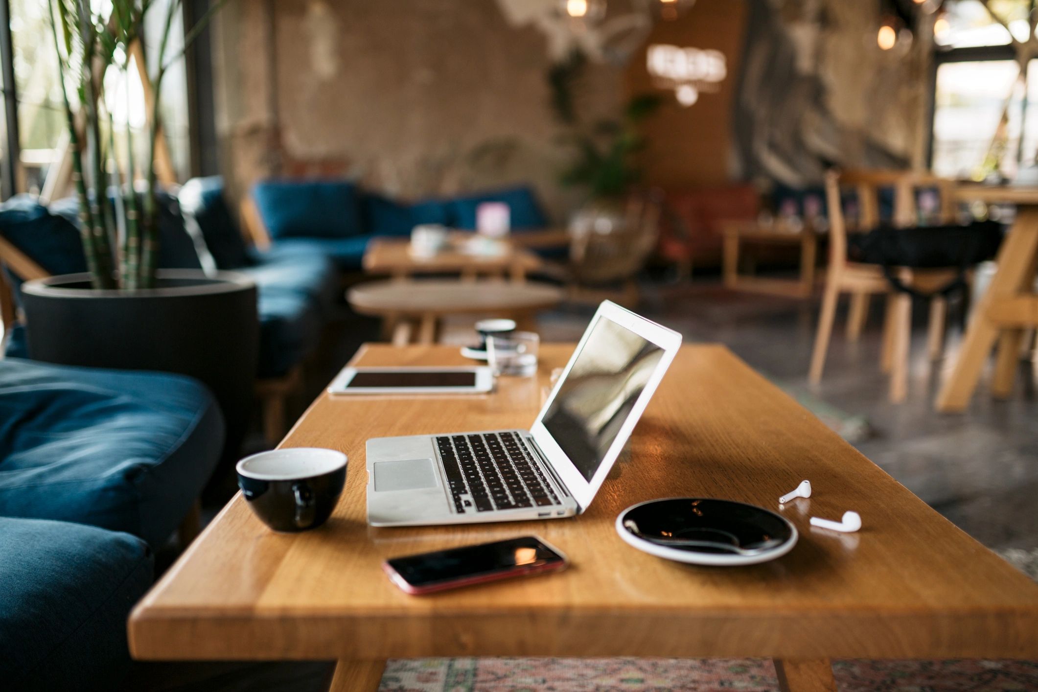 Workspace with laptop and notebook